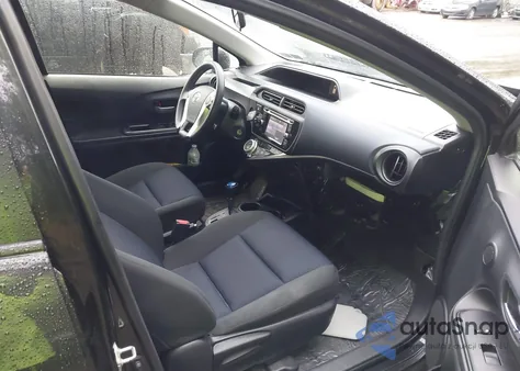 2015 Toyota Prius C Four/One/Three/Two from USA, damaged, VIN JTDKDTB30F1101631